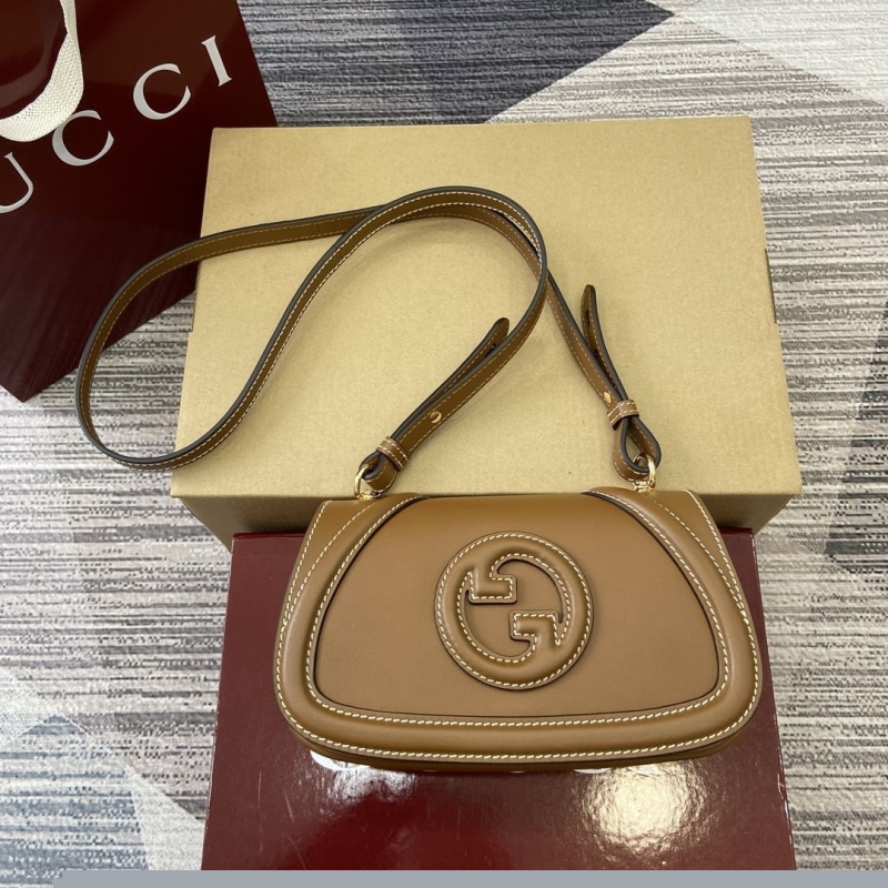 G*u*i satchel bags